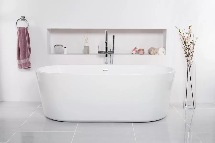 bathtub-white-bathroom-with-flowers-vase-tub-skincare-products-rack